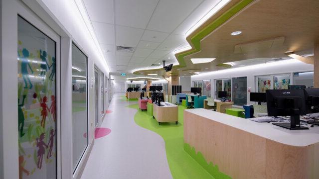 A colorful hospital ward common area